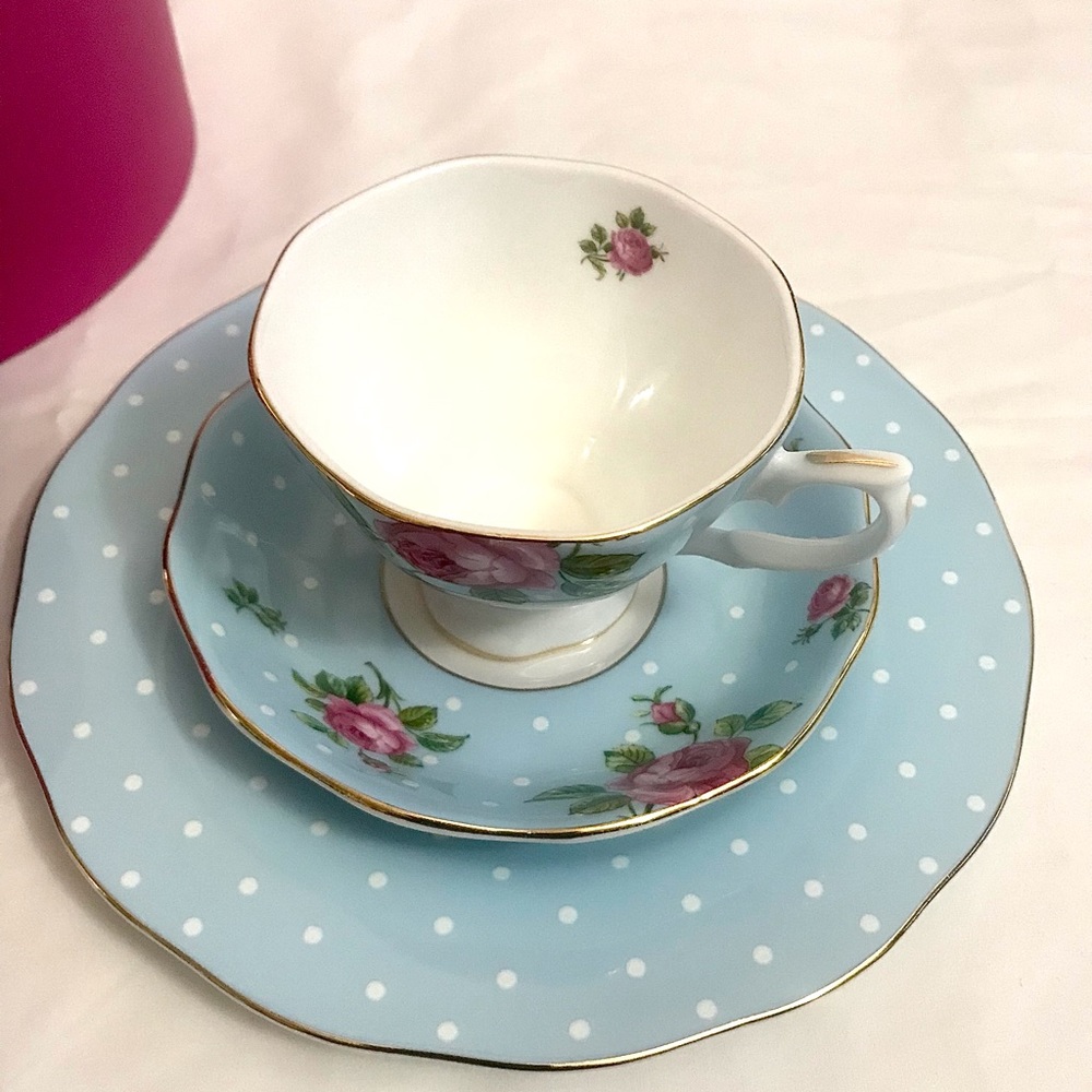 ROYAL ALBERT patterned Polka Blue three-piece tea set.
